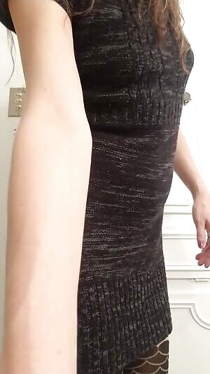 This tiny sweater dress doesn't hide much hehe 37 😏