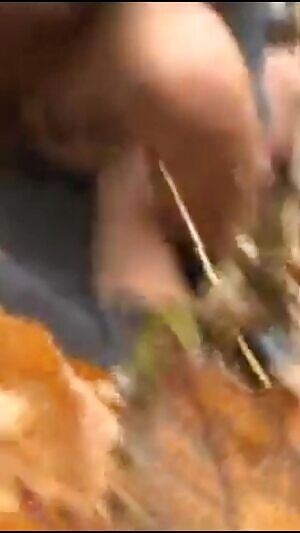 Trashy couple having fun in the park