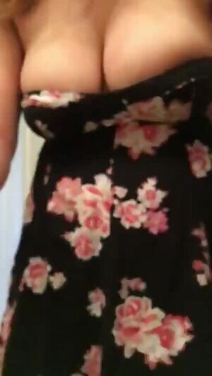 Jumping in a floral swing dress