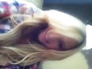 Beautiful blonde girl playing with her juicy pussy