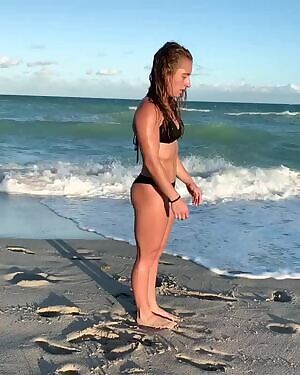 Demi Bagby working out at the beach