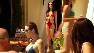 Maggie Q red swimsuit