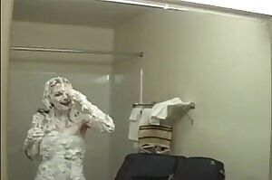 Admiring herself in the mirror afterwards