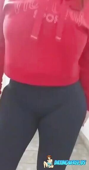 Revealing her huge tits :)