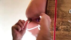 Tied to a chair and fucked with dildos in both holes until I squirted