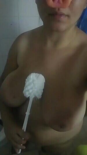 My good pig washing herself with the proper tools