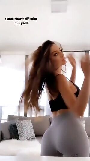 Grabbing her ass