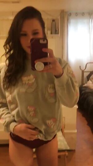 Tiny girl, big sweater 😏 wanna see what’s hiding underneath?