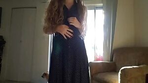 taking of my long black button down dress