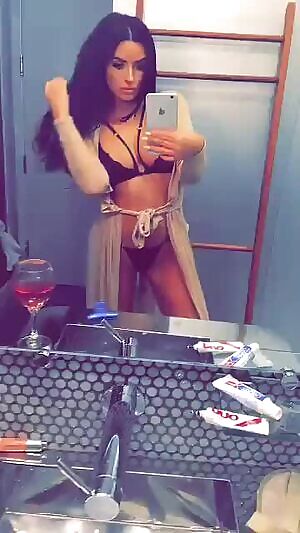 Abigail checking herself out in the mirror