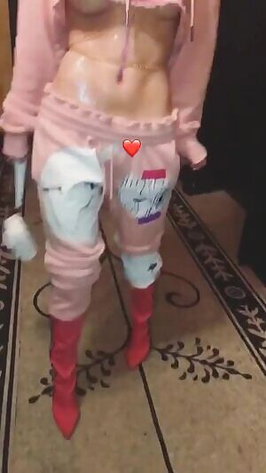 Look at this whore. She is a disgrace and a walking cum-dumpster. I bet her pussy has been destroyed and leaks cum all the time.