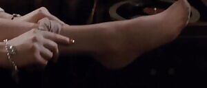 Jennifer Connelly putting on her stockings