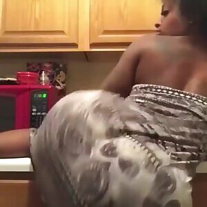 Black girl with a phat ass twerks in kitchen