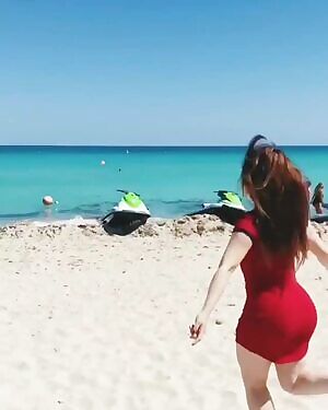 Thick Asian chick on the beach...